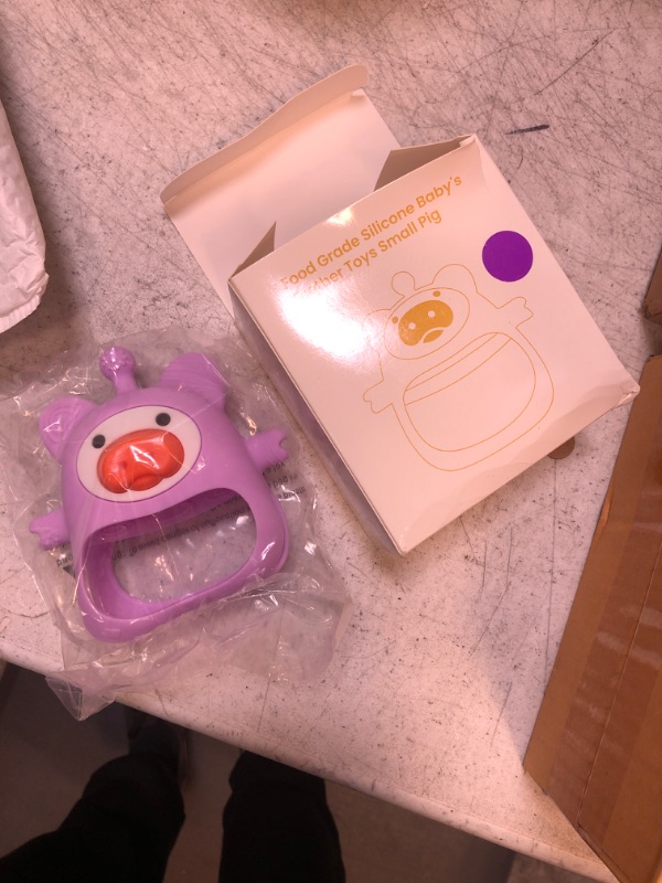 Photo 2 of Baby Teether, Safe and Soothing Silicone Baby Teething Toys for 0-6 Months, Baby Chew Toys for Sucking Needs, BPA Free (Purple)