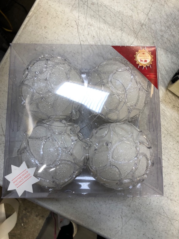 Photo 2 of ZHANYIGY 4.25" Christmas Ball Ornaments 4pc Set Silver Christmas Decorations Tree Balls for Xmas Trees Wedding Party Holiday Decorations Tabletop Small Trees Decoration
