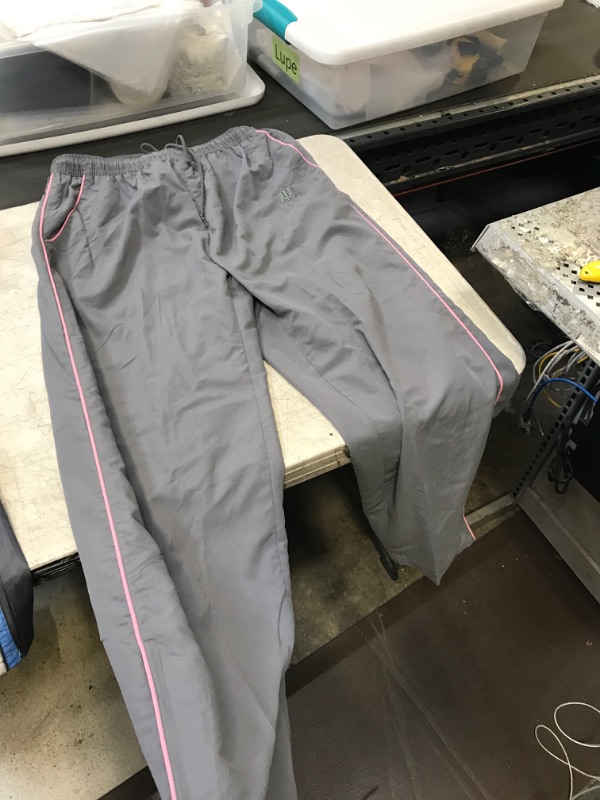 Photo 1 of WOMENS TRACKSUIT PANTS
SIZE LARGE 