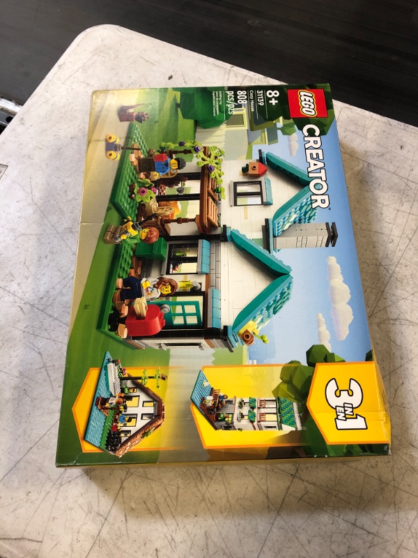 Photo 2 of LEGO Creator 3in1 Cozy House Toy Set 31139 Model Building Kit with 3 Different Houses Plus Family Minifigures and Accessories, Summer DIY Building Toy Ideas for Outdoor Play for Kids, Boys and Girls (FACTORY SEALED)