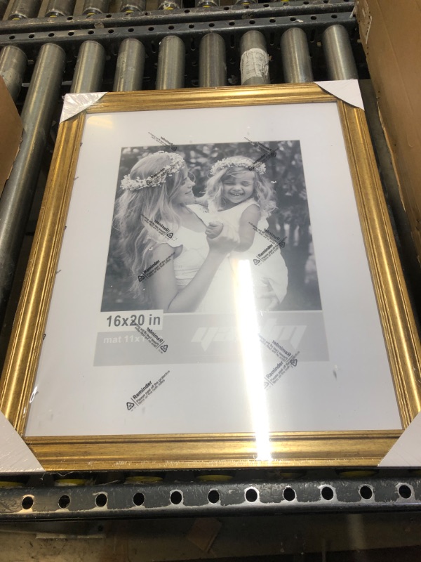 Photo 1 of Yaetm 16x20 Picture Frame Matted to 11x14 1.4" Wide Molding & gold Poster Frame 1pack
