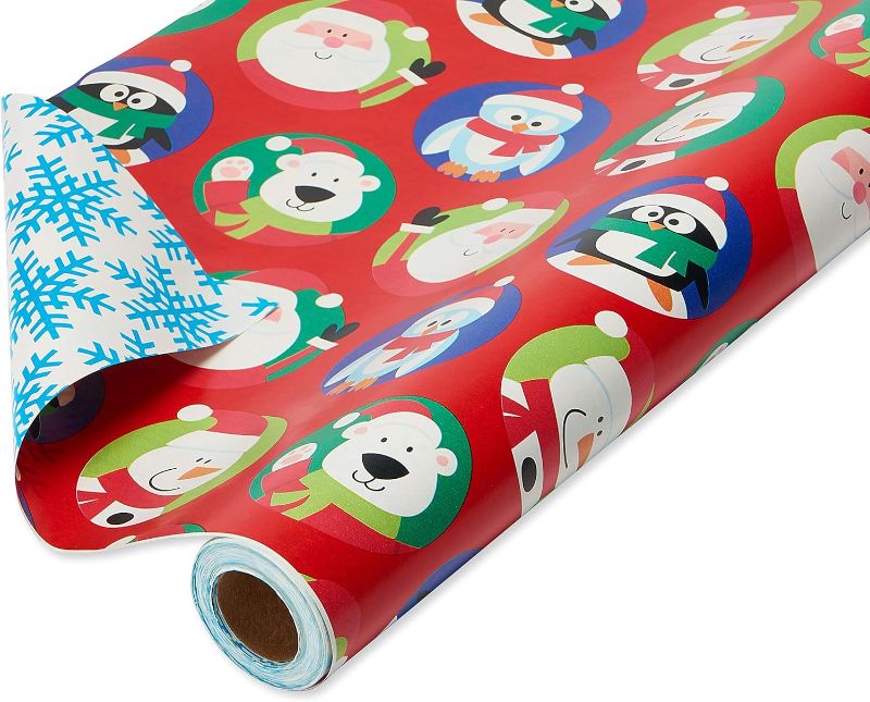 Photo 1 of American Greetings 175 sq. ft. Reversible Kids Christmas Wrapping Paper, Santa and Snowflakes (1 Jumbo Roll 30 in. x 70 ft.)
