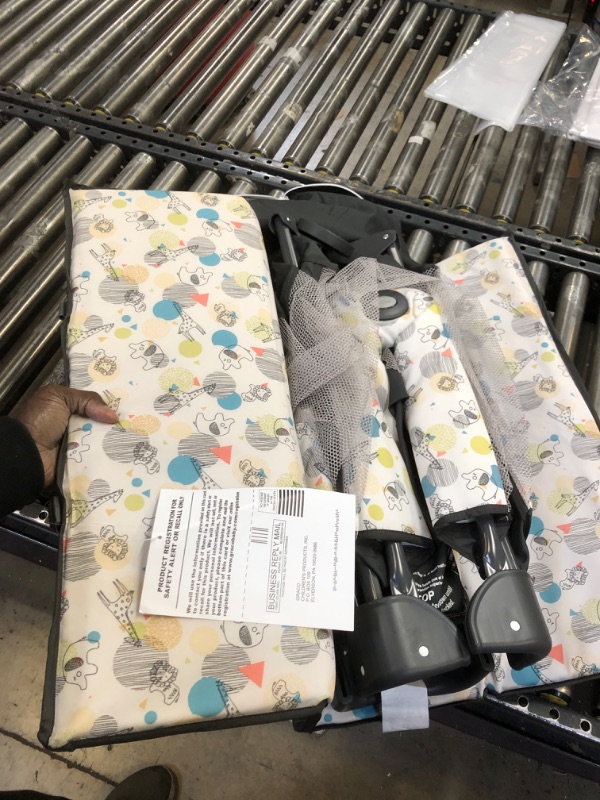 Photo 1 of Graco Pack and Play Portable Playard, Push Button Compact Fold, Carnival Portable Playard Carnival