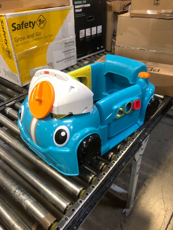 Photo 2 of Fisher-Price Laugh & Learn Crawl Around Car, Blue interactive play center with Smart Stages learning content for babies and toddlers ages 6 months and up