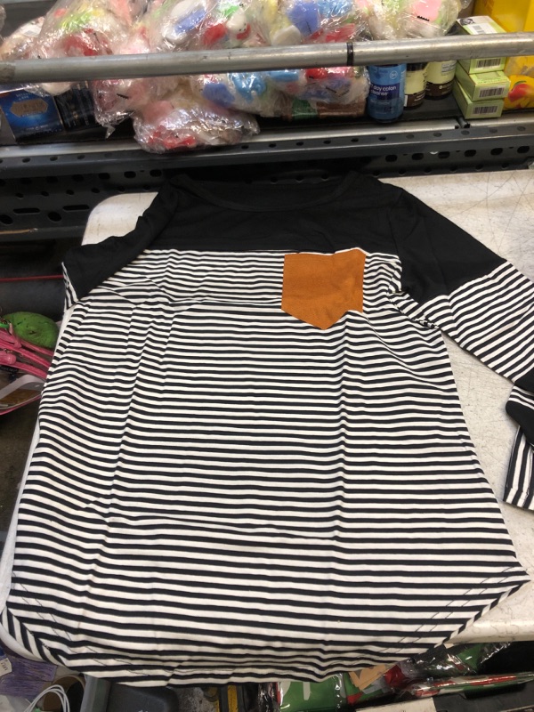 Photo 1 of BLACK AND WHITE LONG SLEEVE SHIRT ( SIZE: SMALL ) 