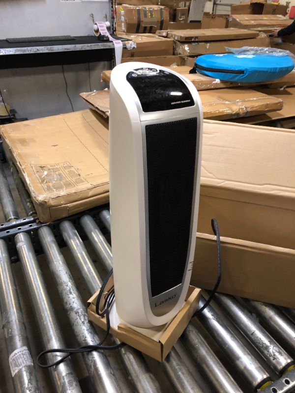 Photo 1 of Lasko Oscillating Digital Ceramic Tower Heater for Home with Overheat Protection, Timer and Remote Control, 22.75 Inches, 1500W, White, 5165