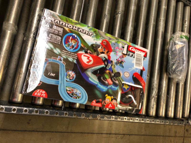 Photo 3 of Carrera First Nintendo Mario Kart Slot Car Race Track - Includes 2 Cars: Mario and Luigi and Two-Controllers - Battery-Powered Beginner Set for Kids Ages 3 Years and Up, 20063028 Mario Kart / Flippers