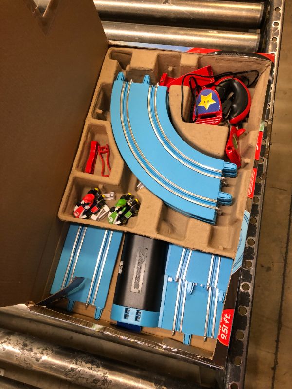 Photo 2 of Carrera First Nintendo Mario Kart Slot Car Race Track - Includes 2 Cars: Mario and Luigi and Two-Controllers - Battery-Powered Beginner Set for Kids Ages 3 Years and Up, 20063028 Mario Kart / Flippers