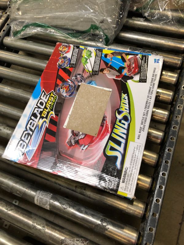 Photo 1 of BEYBLADE Burst Turbo Slingshock Rail Rush Battle Set -- Complete Set Burst Beystadium, Battling Tops, and Launchers (Amazon Exclusive)