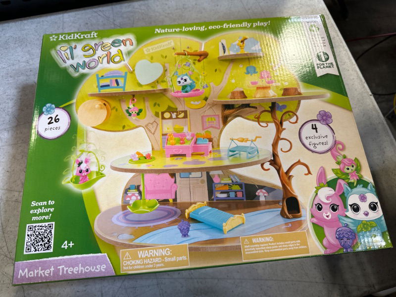 Photo 2 of KidKraft Lil Green World Wooden Market Treehouse Play Set with 26 Accessories