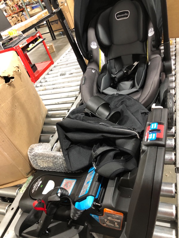 Photo 3 of Evenflo Shyft DualRide Infant Car Seat and Stroller Combo with Carryall Storage (Boone Gray)
