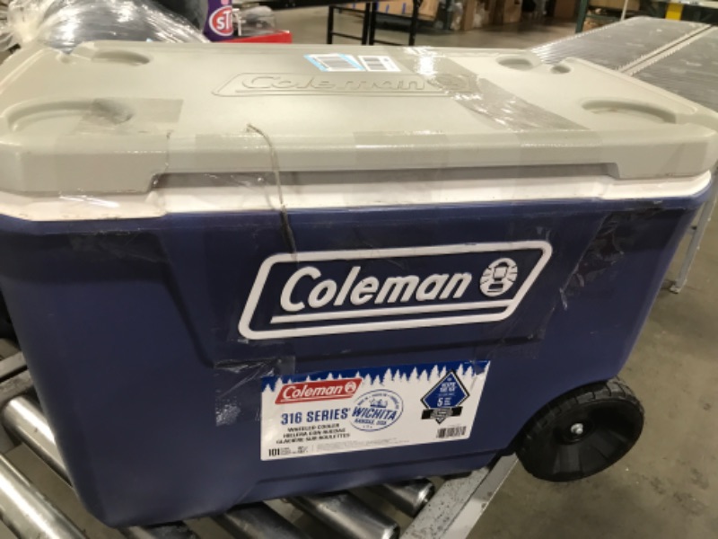 Photo 3 of Coleman 316 Series Insulated Portable Cooler with Heavy Duty Wheels, Leak-Proof Wheeled Cooler with 100+ Can Capacity, Keeps Ice for up to 5 Days Twilight 62qt
"Dirty 
