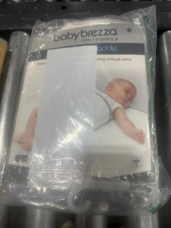 Photo 2 of Baby Brezza Safe Sleep Swaddle Blanket for Crib Safety for Newborns and Infants – Safe, Anti-Rollover Blanket in White, by Tranquilo Reste