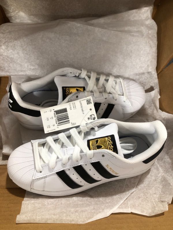 Photo 2 of adidas Originals womens Superstar Sneaker, White/Black/White, 5 US