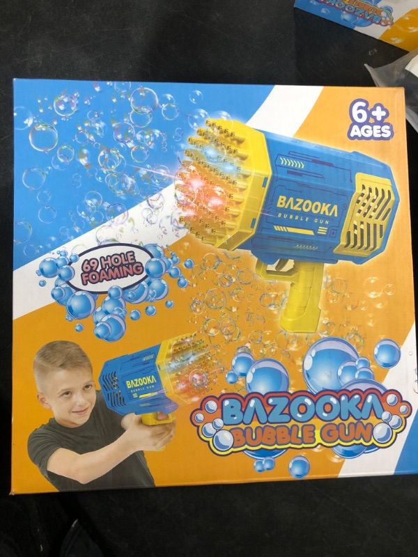 Photo 2 of Bubble , 69 Hole Bubble Machine Gun with Bubble Solution for Kids 3 4 5 6 7 8 9 10 11 12 Year Old, Bubble Maker for Kids Summer Outdoor Toys Birthday Wedding Party, Purple