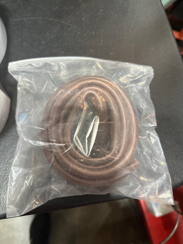 Photo 1 of Door Draft Stopper for Bottom,Seam Seal Strip PVC Cuttable for Bottom, Under Door Sealers Gap Filler 39” Length for Block Wind, Light, Dust, and Noise Brown