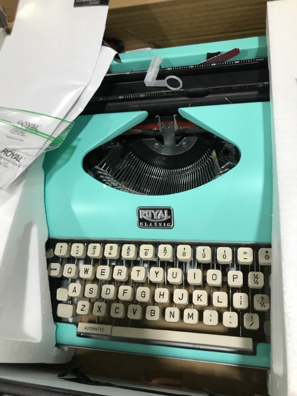 Photo 2 of Royal 79101T Classic Manual Typewriter (Mint Green)