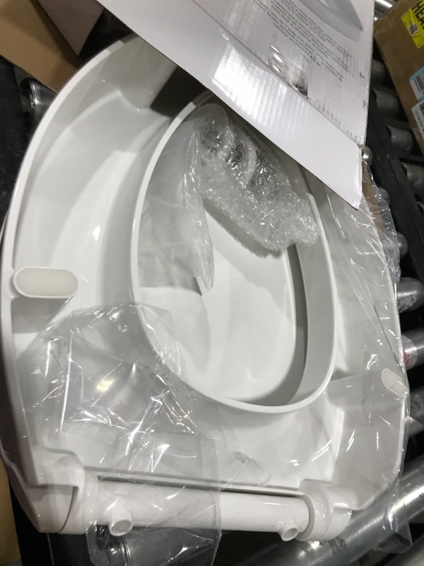 Photo 2 of KOHLER 25875-0 Hyten Elevated Quiet-Close Elongated Toilet Seat, Contoured Seat with Grip-Tight Bumpers, Quick-Attach Hardware, White White Elongated