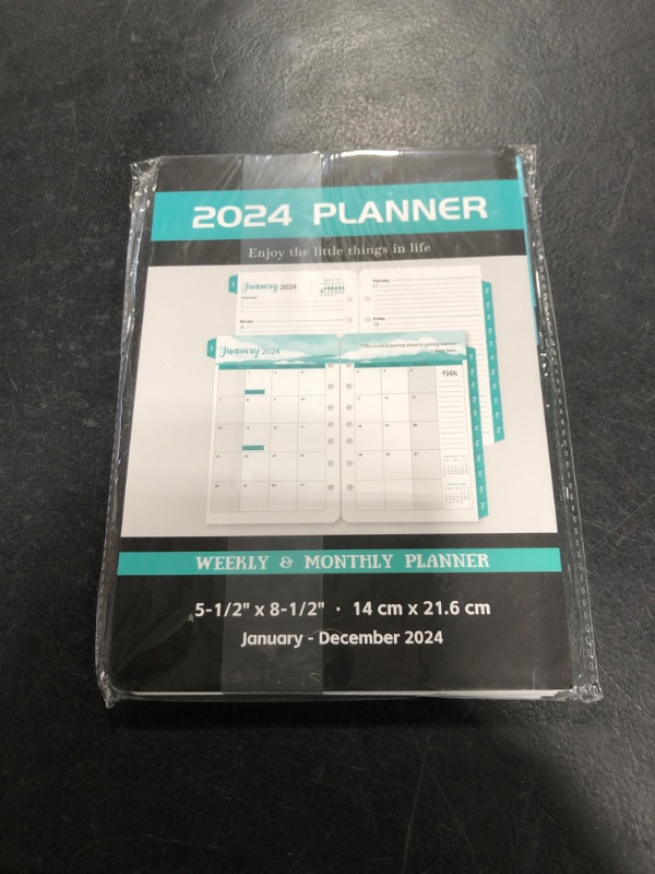 Photo 1 of 2024 PLANNER HOLE PUNCHED 7 RINGS 