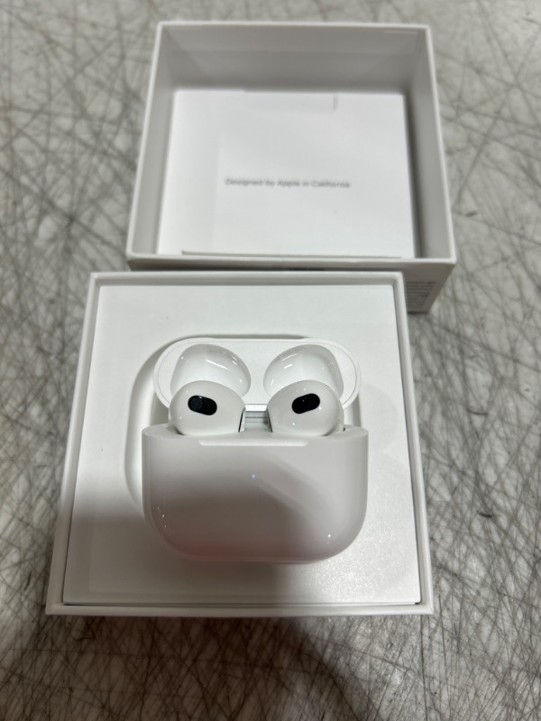 Photo 3 of Apple AirPods (3rd Generation) Wireless Ear Buds, Bluetooth Headphones, Personalized Spatial Audio, Sweat and Water Resistant, Lightning Charging Case Included, Up to 30 Hours of Battery Life Without AppleCare+