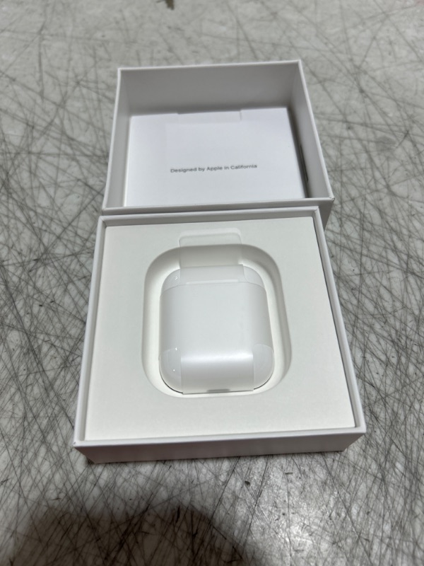 Photo 2 of Apple AirPods with Charging Case (Latest Model)