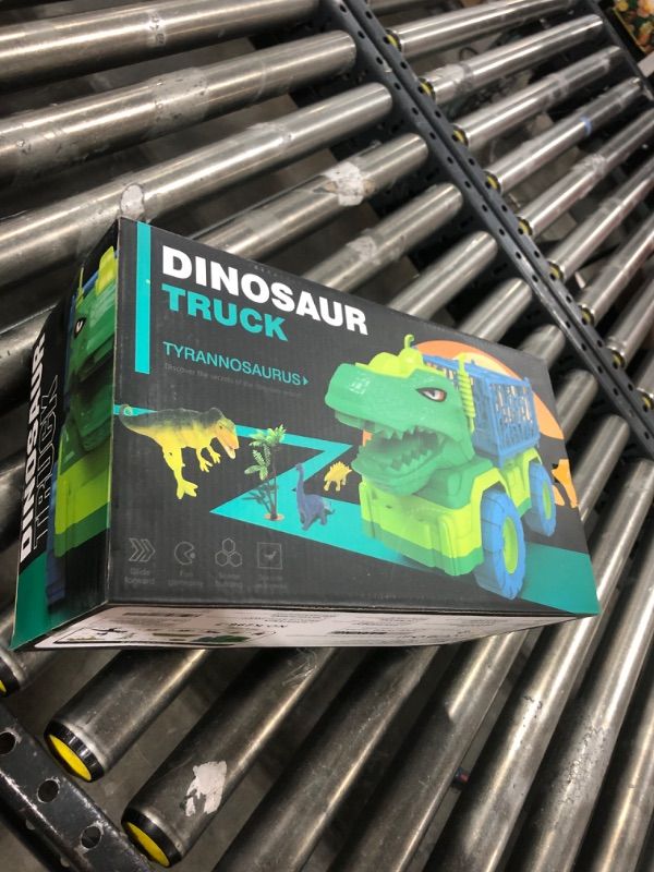 Photo 1 of TEMI Dinosaur Truck Toys for Kids 3-5 Years, Tyrannosaurus Transport Car Carrier Truck with 8 Dino Figures, Activity Play Mat, Dinosaur Eggs, Capture Jurassic Dinosaur Play Set for Boys and Girls Tyrannosaurus Dino Truck