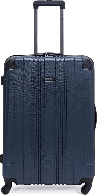 Photo 1 of Kenneth Cole REACTION Out of Bounds Lightweight Hardshell 4-Wheel Spinner Luggage, Naval, 28-Inch Checked
