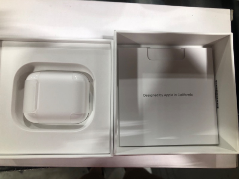 Photo 3 of Apple AirPods with Charging Case (Latest Model)