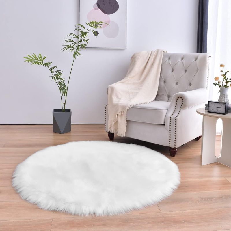 Photo 1 of duduta White Round Faux Sheepskin Fur Rug 4x4 ft, Fluffy Shaggy Circle Rugs for Nursery Bedroom Living Room Decor, Machine Washable
