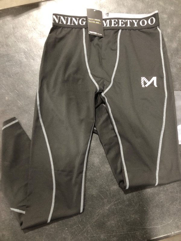 Photo 1 of Boy's 1pc Compression pants Size M 