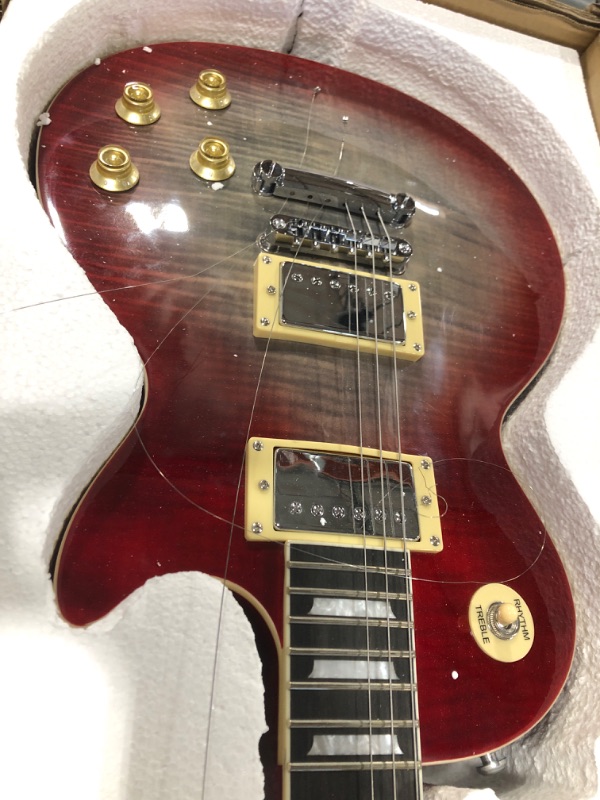 Photo 1 of **STRINGS DAMAGED** Leo Jaymz 24.75" Single Cut Curved Top Sunburst Electric Guitar - Classic single cut top curved body - Mahogany Body and Neck?Ebony Fingerboard (SunBurst)