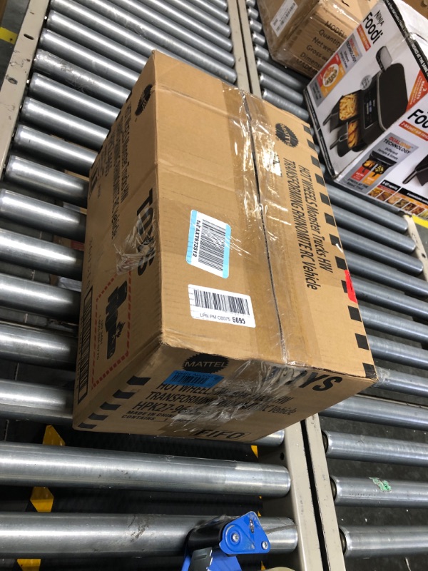 Photo 1 of Hot Wheels Monster Trucks HW Transforming Rhinomite RC in 1:12 Scale with 1:64 Scale Race Ace Toy Truck, Converts into Launcher, Connects to Orange Track