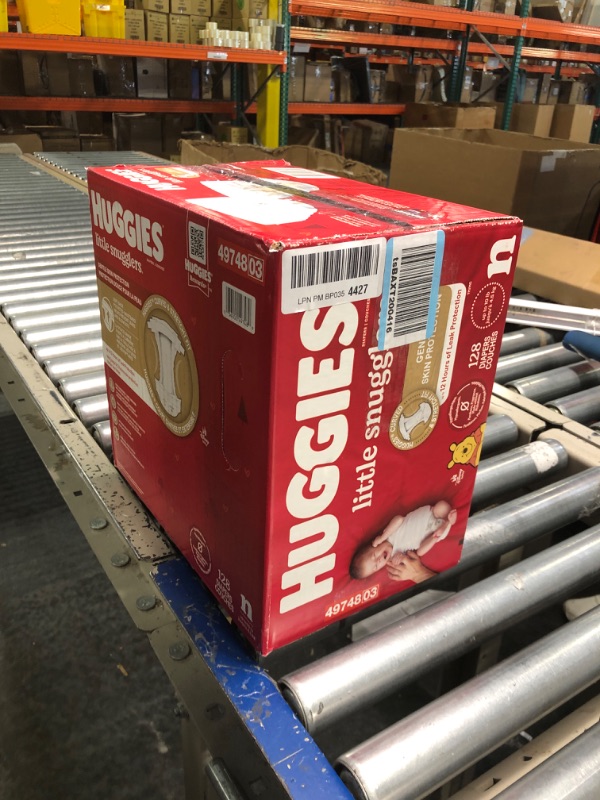Photo 1 of Baby Diapers Size Newborn (up to 10 lbs), 128ct, Huggies Little Snugglers Newborn (128 Count)