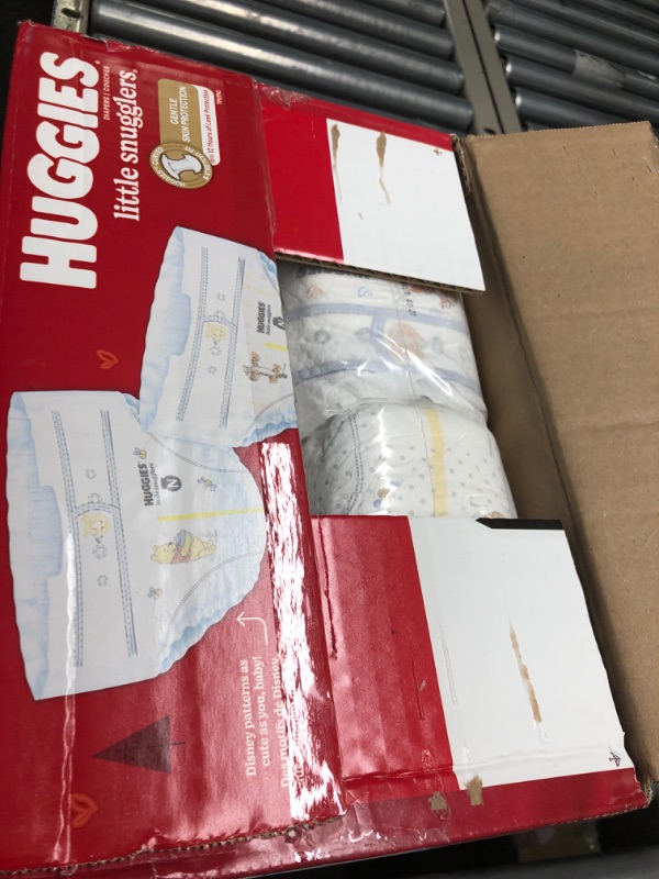 Photo 1 of Baby Diapers Size Newborn (up to 10 lbs), 128ct, Huggies Little Snugglers Newborn (128 Count)