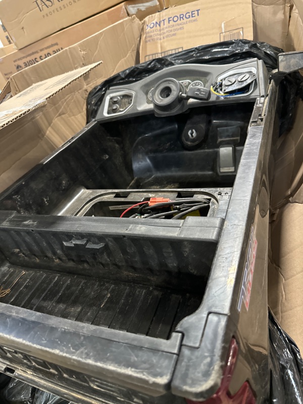 Photo 3 of *** NOT FUNCTIONAL**** SELLING AS PARTS***
 12V Battery Powered Licensed Chevrolet Silverado Trail Boss LT Kids Ride On Truck Car Electric Vehicle Jeep with Remote Control, MP3, LED Lights - Black