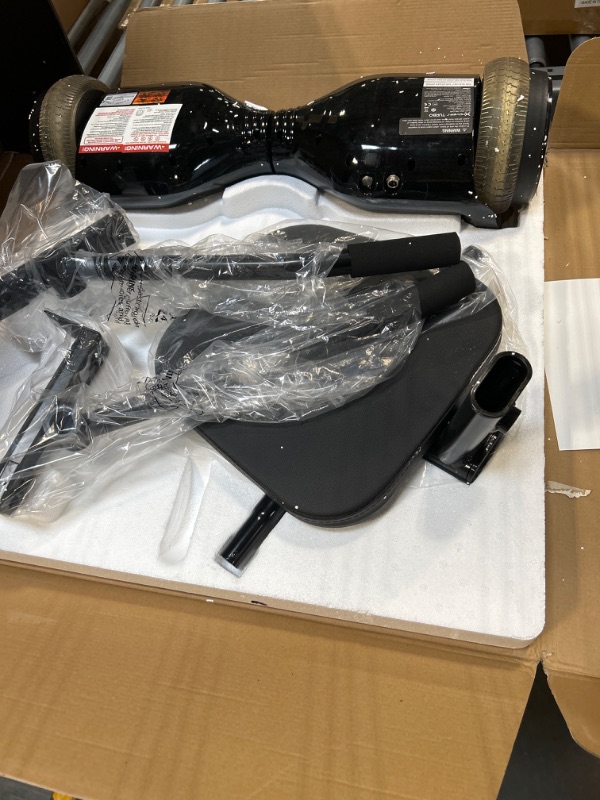 Photo 1 of Hover-1 Turbo Hoverboard Combo | Seat Attachment Buggy, 7 MPH Top Speed, 6 Mile Range, 400W Motor (2x 200W), 4.5Hr Charge Time, 220lbs Max Weight, Black ***USED***WHEN RUNNING ONE WHEEL WILL TURN OFF*** 