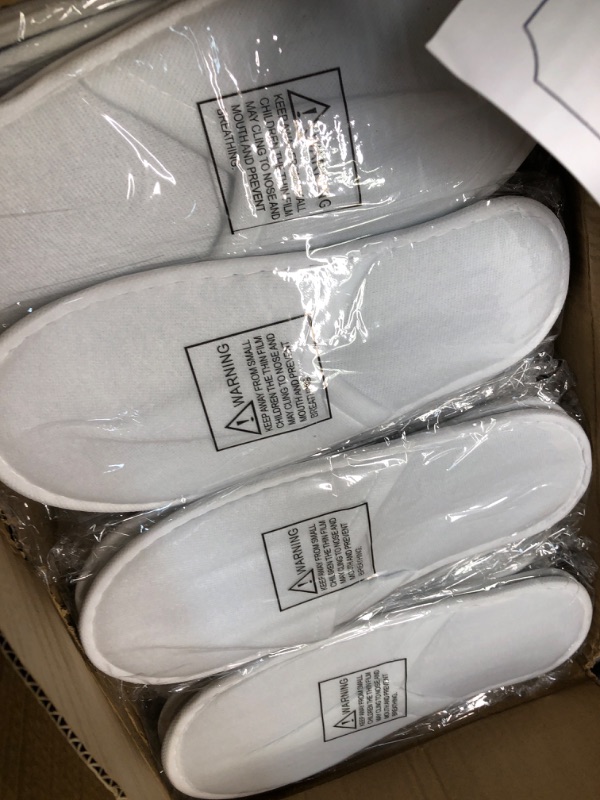 Photo 1 of Juvale 24 Pairs Disposable House Slippers for Guests, Bulk Pack for Hotel, Spa, Shoeless Home, White Closed Toe (US Men Size 10, Women 11)