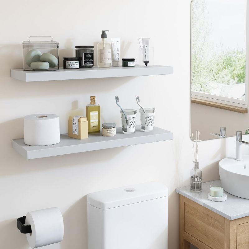 Photo 1 of Fixwal White Floating Shelves, 24 x 8in Large and Deep Bathroom Decor Wall Shelves, Bathroom Shelves Set of 2, with Invisible Brackets for Living Room,Bedroom and Kitchen(White)