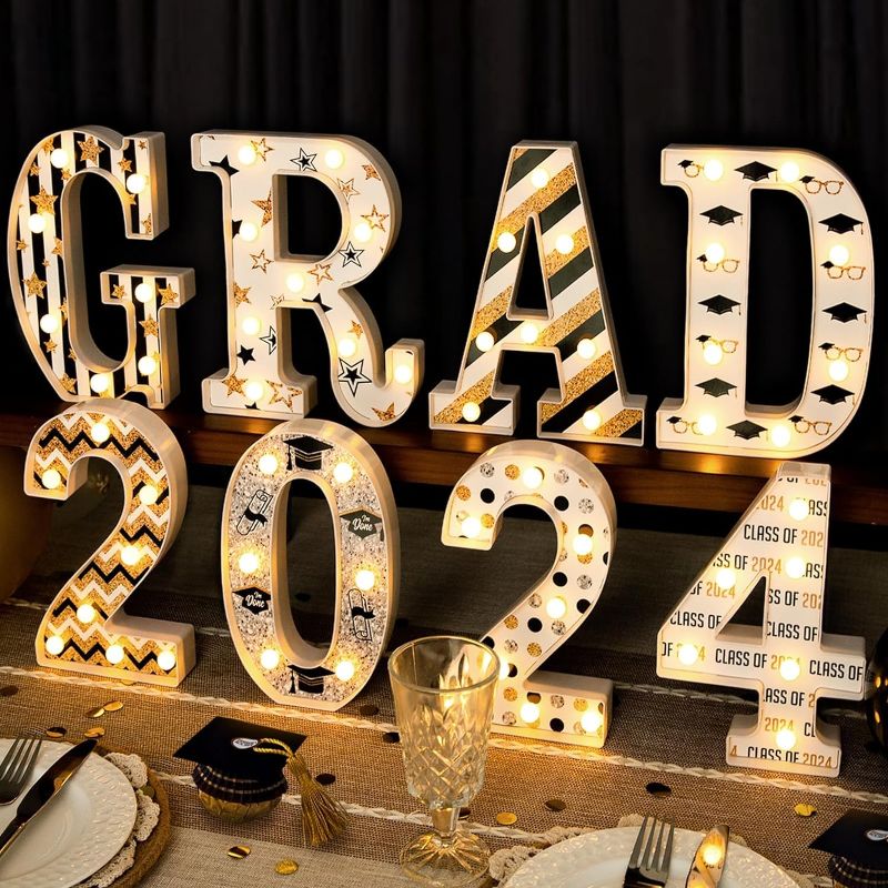 Photo 1 of *** NEED BATTERIES****Graduation Party Decorations 2024 - 8 LED Marquee Light Up Letters “GRAD 2024” - Class of 2024 Graduation Decor for Kindergarten Preschool High School College Wall Table Ornaments Party Supplies