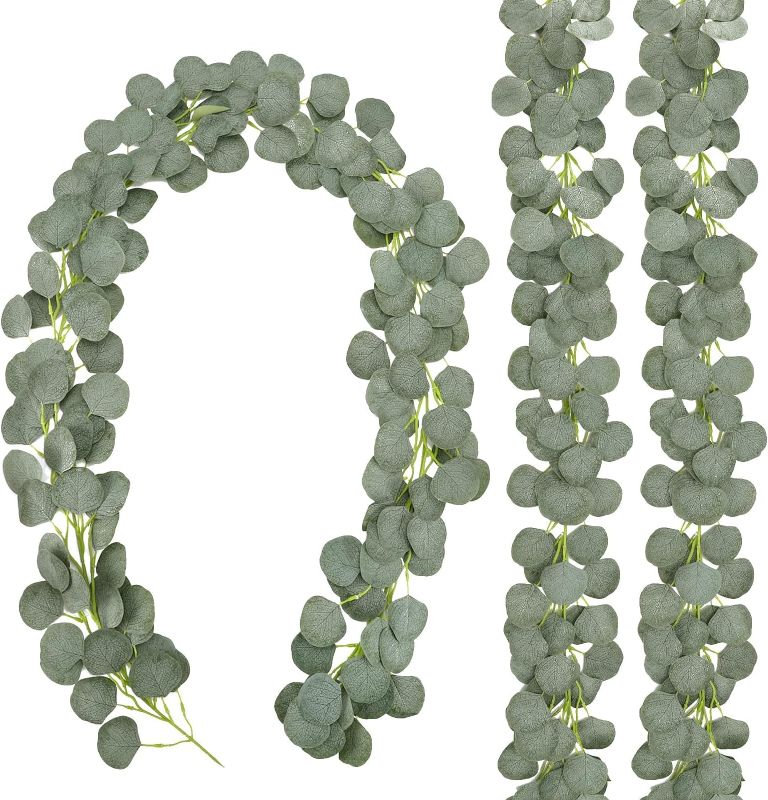 Photo 1 of CEWOR 3 Pack Artificial Eucalyptus Garland 146 Leaves Greenery Silk Eucalyptus Leaves Vines Faux Silver Dollar Eucalyptus Plants for Wedding Party Home Decoration