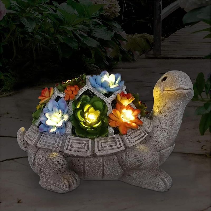 Photo 1 of ***DAMAGED***
 Solar Garden Outdoor Statues Turtle with Succulent and 7 LED Lights - Lawn Decor Tortoise Statue for Patio, Balcony, Yard Ornament - Unique Housewarming Gifts
