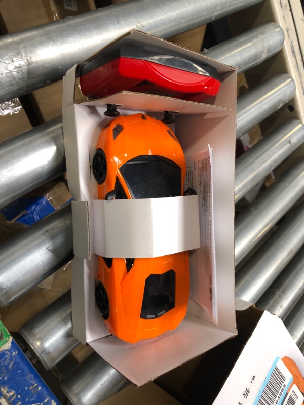 Photo 1 of CMJ RC Cars Lamborghini LP700-4 Remote Control RC Car Officially Licensed 1:24 Scale Working Lights 2.4Ghz. Great Kids Play Toy Auto (Orange)

