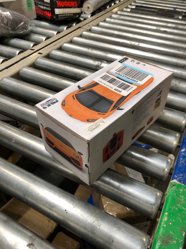 Photo 1 of CMJ RC Cars Lamborghini LP700-4 Remote Control RC Car Officially Licensed 1:24 Scale Working Lights 2.4Ghz. Great Kids Play Toy Auto (Orange)
