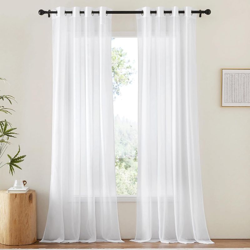 Photo 1 of NICETOWN White Sheer Curtains & Drapes 96 inches Long for Living Room - Grommet Top Solid Lightweight & Airy Gauzy Window Treatments with Light Filtering for Bedroom, 2 Panels, W54 x L96
