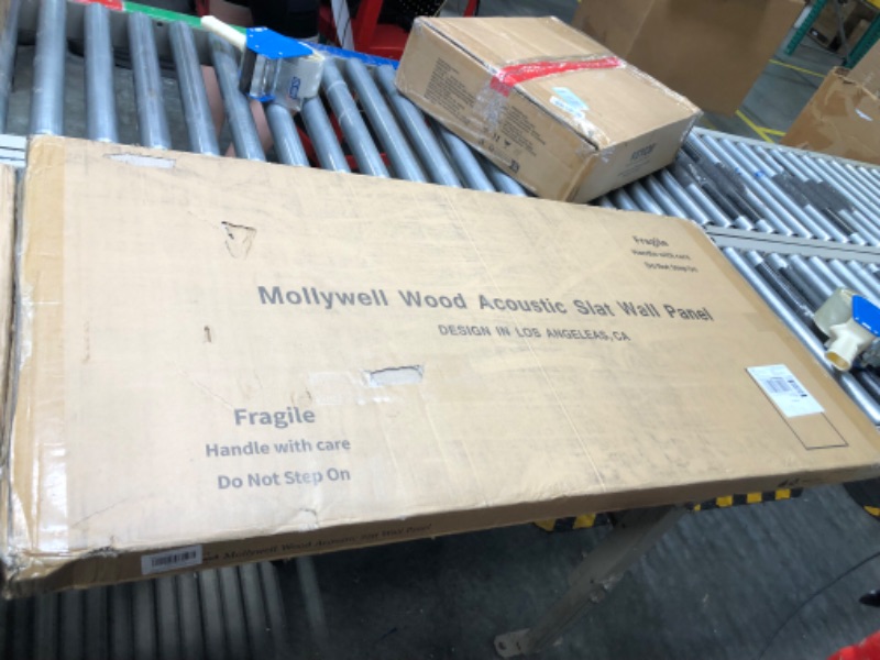 Photo 1 of Mollywell Wood Slat Wall Panel, Easy Installation, Versatile, Enhanced Acoustic Design, Suitable for Living Room, Bedroom, Kitchen & Offices (2 Pcs, Walnut), 47.2x23.6x0.87 Inch Each 2 Pcs Walnut****USED****LIGHT WOOD*****BOX IS DAMAGED**