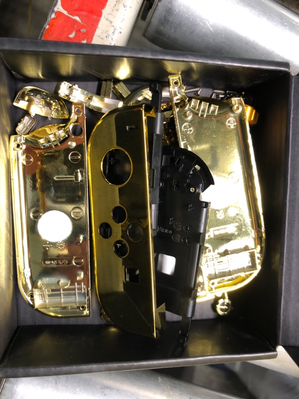 Photo 1 of eXtremeRate Chrome Gold Joycon Handheld Controller Housing with Full Set Buttons, DIY Replacement Shell Case for Nintendo Switch & Switch OLED Model Joy-Con – Console Shell NOT Included