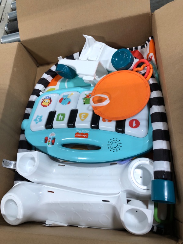 Photo 1 of Fisher-Price Baby Activity Mat Glow and Grow Kick & Play Piano Gym, Portable Musical Toy with Smart Stages Learning, Ages 0+ Months, Blue