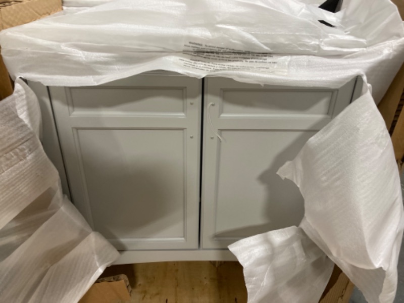 Photo 4 of ***SINK IS CRACKED ON BACK ON BOTH SIDES*** 

Home Decorators Collection Sassy 36in. W x 22 in. D x 34 in. H Single Sink Bath Vanity in Dove Gray with Carrara Marble Top