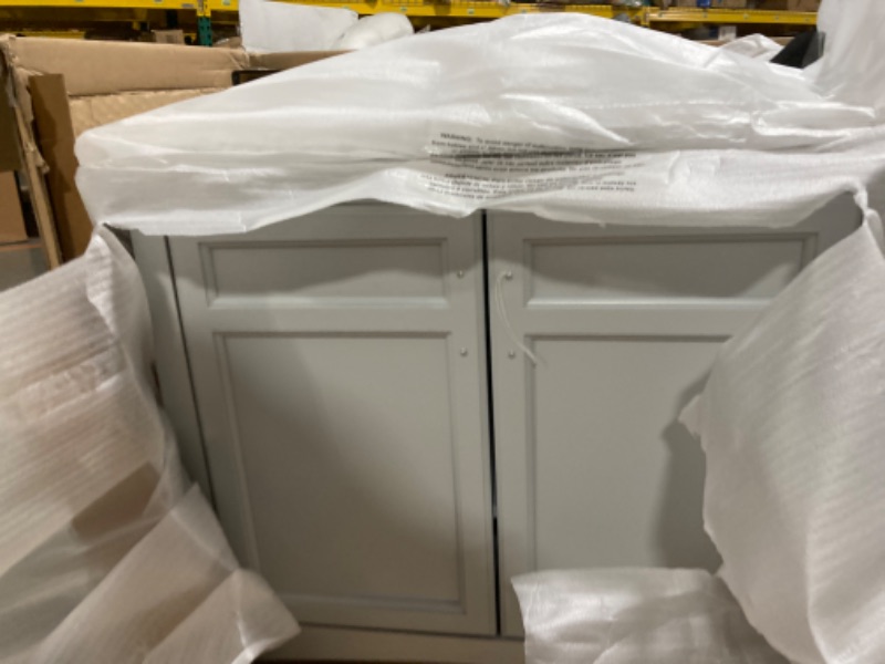 Photo 5 of ***SINK IS CRACKED ON BACK ON BOTH SIDES*** 

Home Decorators Collection Sassy 36in. W x 22 in. D x 34 in. H Single Sink Bath Vanity in Dove Gray with Carrara Marble Top