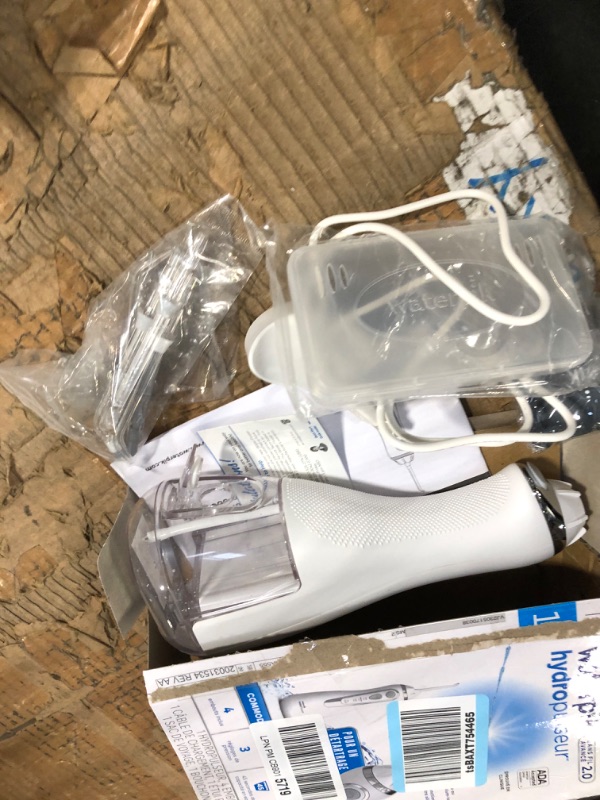 Photo 1 of  Waterpik Cordless Advanced Water Flosser For Teeth, Gums, Braces, Dental Care With Travel Bag and 4 Tips, ADA Accepted, Rechargeable, Portable, and Waterproof, White WP-580 slighlty used
